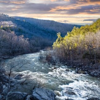 River at Sunset by Ralph Baker