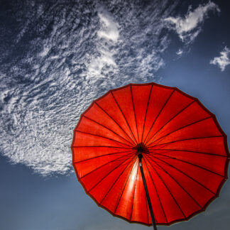 Small Umbrella, Big Sky by Rob Baker