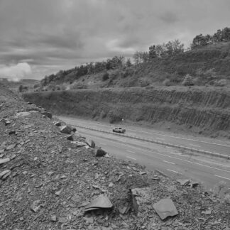 I-68 road cut with truck by Gregory Bucher
