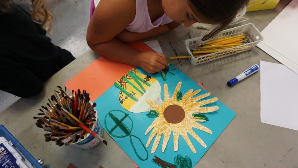 Another camper works on her own still life