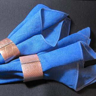 pair of napkin rings by Sarah Porter