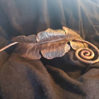 Fold formed leaf hair piece by Eileen Suffian