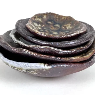 Nesting Plates by Nada Romanos Abizaid
